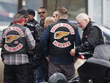 Friends and associates of Hell Angels' Bob Green arrive at Fraserview Hall for a memorial service in Vancouver.