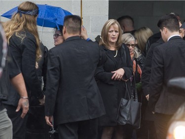 Friends and associates of Hell Angels' Bob Green arrive at Fraserview Hall for a memorial service in Vancouver.