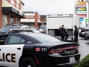 A large contingent of Victoria police were at the Gorge Road East Tim Hortons on Sept. 7 after an agitated man barricaded himself inside. The situation quickly escalated and two emergency negotiators were called in to help resolve the incident involving a homeless drug addict.   DARREN STONE / Times Colonist