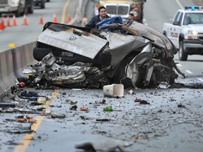 Debris litters the Sea to Sky Highway north of Lions Bay in West Vancouver on February  22, 2012.  The Resort Municipality of Whistler wants to reduce road closure times after accidents.