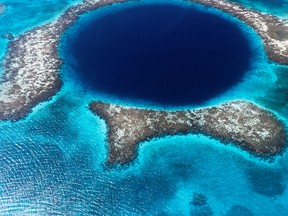 A great blue holeI n the barrier reef in Belize.