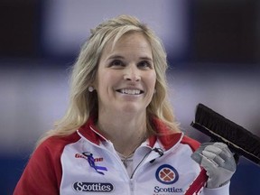 Team Canada skip Jennifer Jones smiles during the bronze medal game against Manitoba at the Scotties Tournament of Hearts, in Grande Prairie, Alta., on Sunday, Feb. 28, 2016. Jones of Winnipeg opened the Canada Cup with a 9-4 victory over Edmonton&#039;s Kelsey Rocque on Wednesday morning at the Keystone Centre. THE CANADIAN PRESS/Jonathan Hayward