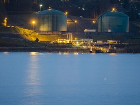 Kinder Morgan Trans Mountain Expansion Project's Westeridge loading dock, at centre with green tanks, is seen in Burnaby, B.C., on Friday, Nov. 25, 2016. The Federal Government has given conditional approval to allow the expansion of the pipeline.