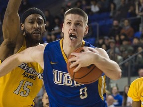 UBC Thunderbirds forward Conor Morgan bulls his way to the hoop past the Ryerson Rams in the opening game of the 2016 CIS Final 8 national championships last March at the Doug Mitchell Arena.