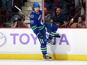 Ben Hutton celebrates after scoring on an overtime penalty shot.