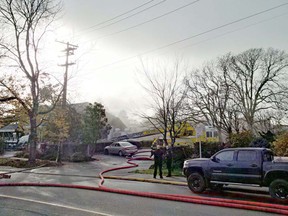 Firefighters battle a fire at Spinnakers Brew Pub on Wednesday, Nov. 23, 2016.