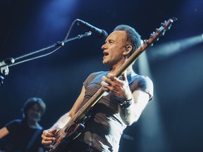 In this Saturday, Nov. 12, 2016 photo provided by Universal Music France, British musician Sting performs on stage at the Bataclan concert hall in Paris, France, Saturday, Nov. 12, 2016. A concert by British pop legend Sting is marking the reopening of the Paris' Bataclan concert hall one year after suicidal jihadis turned it into a bloodbath and killed 90 revelers. (Boris Allin/Universal Music France via AP) MANDATORY CREDIT ORG XMIT: REB112