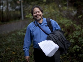 Sanctuary-seeker Jose Figueroa speaks during a press conference in front of the Fraser Building, Faculty of Law, at the University of Victoria in Victoria B.C., Monday, November 28, 2016 prior to a federal court hearing examining CBSA decision labelling him a terrorist.