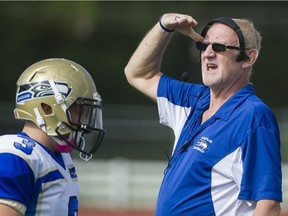 LANGLEY September 09 2016. Seaquam Seahawks head coach Jerry Mulliss watches his team play against the Langley Saints in a BC High School football game at McLeod Athletic Park Langley, September 09 2016.  ( Gerry Kahrmann  /  PNG staff photo)  ( Prov / Sun Sports ) 00045011A Story by Howard Tsumura [PNG Merlin Archive]