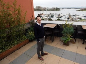 Latitude Geographics CEO Steven Myhill-Jones on an outdoor patio, one of several perks the company employs to retain staff by keeping employees happy.