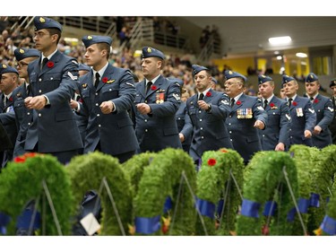 Members of the Canadian Air Force march past wreaths played in temperance of fallen soldier during a Remembrance Day ceremony in Edmonton Alta, on Friday November 11, 2016.