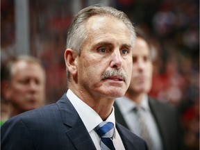 VANCOUVER, BC - OCTOBER 27:  Head coach Willie Desjardins of the Vancouver Canucks looks on from the bench during their NHL game against the Montreal Canadiens at Rogers Arena October 27, 2015 in Vancouver, British Columbia, Canada.