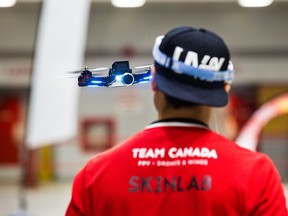 SURREY November 27, 2016 - Paul Baur flying his drone during the West Coast Drone Racing League's Winter Indoor Series race at Cloverdale Agriplex. He represents Team Canada West.