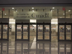 File: As of Dec. 1, Mexicans are no longer required to obtain a visa to come to Canada.