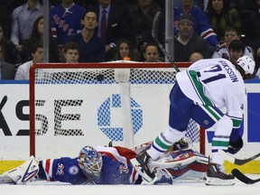 Loui Eriksson of the Canucks scores his first goal of the season.