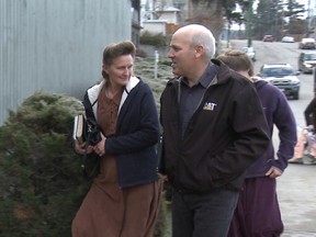 Emily Gail Crossfield Blackmore (left) and James Oler of Bountiful, B.C. enter the court house in Cranbrook at the start of their trial Tuesday on charges of taking a minor into the U.S. for sexual purposes.