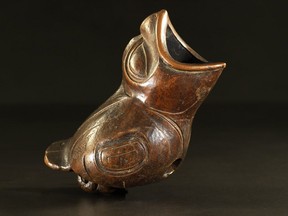 A late 19th-century Tlingit pipe bowl in the form of a bird made out of hardwood and copper is among more than 200 Northwest Coast art works donated to the Museum of Anthropology.