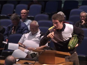 A young man makes a point about the Surrey’s natural abundance with vegetable in hand, in a video still last week from Surrey council. Several years of Surrey council videos are gone, sparking a debate about the value of such records.