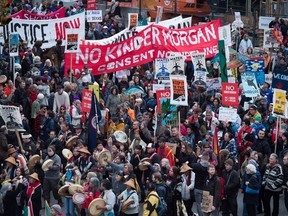 Thousands of people march in protest against the Kinder Morgan Trans Mountain pipeline expansion in Vancouver on Nov. 19. Prime Minister Justin Trudeau gave federal approval to the project on Nov. 29.