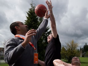 Ravi Kahlon, left, is seen here playing basketball with Adrian Dix, centre, and Chris Wilson. Kahlon said it would be shame for Delta to lose the transition house.