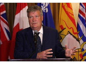 Deputy premier and B.C. Housing Minister Rich Coleman speaks to media after a federal-provincial housing meeting in Victoria on June 28, 2016.