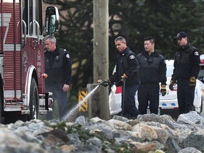 A group of cyclists makes their way along River Road in Richmond, where earlier in the day a group of cyclists was struck by a vehicle.