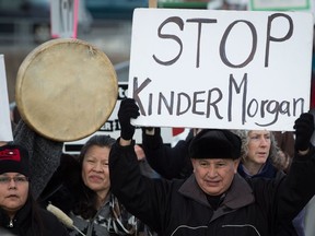Grand Chief Stewart Phillip, president of the Union of B.C. Indian Chiefs, demonstrates against Kinder Morgan outside National Energy Board hearings on the proposed Trans Mountain pipeline expansion.