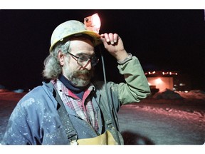 Miner Bruce Green emerges from the Asbestos mine at the end of his 8 hour shift at 8:05 am, one of the last shifts before the mine is shut down in the town of Cassiar, B.C in July 1992.