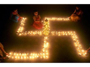 Vancouver's Promod Puri, author of a new book on Hinduism, has seen  priests drawing swastikas during public prayers. "And the moment these ceremonies are over the swastika is erased.”