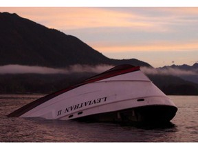 The bow of the Leviathan II, a whale-watching boat owned by Jamie's Whaling Station carrying 24 passengers and three crew members, is seen near Vargas Island as it waits to be towed into Tofino on Oct. 27, 2015, for inspection.