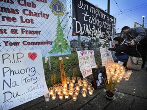 A vigil for Tony Du was held a month after he was shot and killed by a VPD officer at the intersection of Knight Street and East 41st Avenue.
