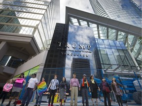 File photo shows members of the local Muslim community joined in solidarity with the gay community to protest outside of the new Trump Tower in downtown Vancouver, on June 19, 2016.