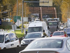 Traffic on the North Shore's portion of Highway No. 1 squeezes into four lanes on the orange-coloured bridges over Lynn Creek.