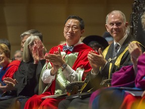 Santa Ono (centre) was installed as UBC"s new president at the university's Chan Centre in Vancouver.
