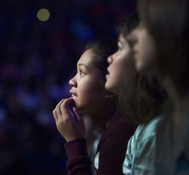 Young fans are transfixed watching We Day celebrations at Rogers Arena in Vancouver on Thursday.
