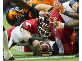 VANCOUVER June 25 2016.  Calgary Stampeders QB #15 Andrew Buckley is stopped on the goal line by the BC Lions in a regular season CFL football game at BC Place, Vancouver June 25 2016. ( Gerry Kahrmann  /  PNG staff photo)   ( For Prov / Sun Sports )  20043919A [PNG Merlin Archive]