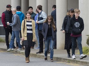 Friends of Letisha Reimer leave South Abbotsford Church after a memorial service in Abbotsford Friday.