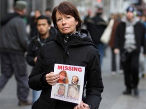 Shelley Fillipoff is shown in January 2013 holding a sheet of photos of her daughter, Emma. Shelley continues to keep her daughter's name in the public eye after four years of fruitless searching.