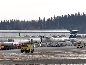 A WestJet flight is safely on the ground at Prince George Airport after reporting landing gear trouble Tuesday, Nov. 22, 2016.