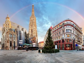 Panorama view of Vienna Square with rainbow, and Stephens Cathedral.