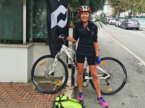 Our reader/writer Janis Connolly outside the Hotel Dory after an arduous day of cycling!