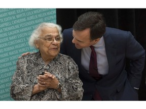 Minister of Finance Bill Morneau speaks with Wanda Robson, sister of Viola Desmond, during a ceremony in Ottawa earlier this month. Desmond was named as the first Canadian woman to appear on a banknote. The only other woman to be on a Canadian banknote was Queen Victoria's granddaughter Princess Patricia in 1917, when her father was Governor General.