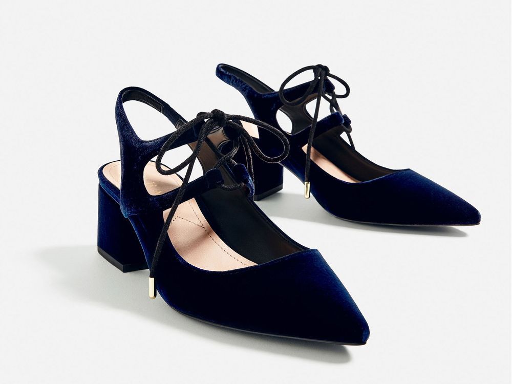 Blue beauties There are heels -- and then there are these stunning blue velvet slingbacks. The pointed-toe, tie-up style is sure to look super slick with tights this winter, and just about everythinge else come spring. Zara | 49.90 