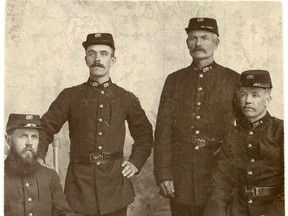 Edwards Brothers photo of Vancouver's first letter carriers. An old Province story attached to the back identifies them as (L-R) G.P. Carr, S.C. Cornwall, D.R. Reid and M.E. Bolton. The story says they started on Feb. 1, 1895.