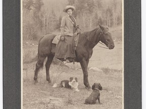 Emily Carr on horseback, likely in 1909 in the Cariboo. Photographer unknown. Text on the back identifying the photo is by Ira Dilworth.