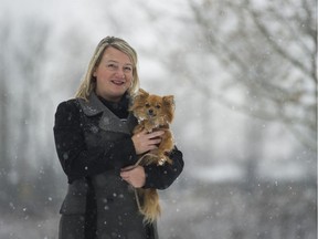 Marcie Moriarty, Chief Prevention and Enforcement officer BCSPCA and her dog, Pip, Vancouver, December 09 2016.