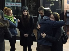 Friends of Emily Sheane console each other outside Vancouver Provincial Court on Thursday after the start of a sentencing hearing for Ibrahim Ali, convicted of killing Sheane in a fatal hit and run on March 9, 2016.