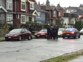 Police at the scene of a reported shooting at a home near the corner of Georgia and Boundary.