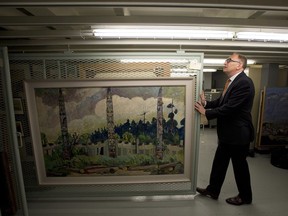 Royal B.C. Museum CEO Jack Lohman shows off one of the institution's 1,100 Emily Carr works.