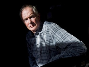 John Furlong poses in Toronto on Tuesday, Oct. 29, 2013.